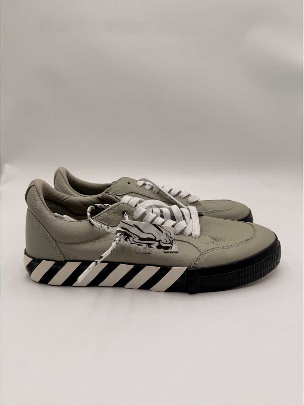 Off-White "Low Vulcanized" sneakers in a "Khaki Green" Size 46
